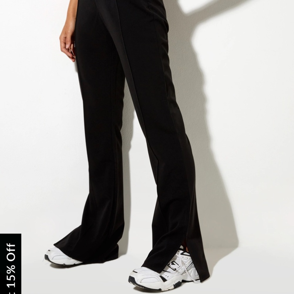 Black Dress Pants. Trendy flare shape at bottom with a split hem